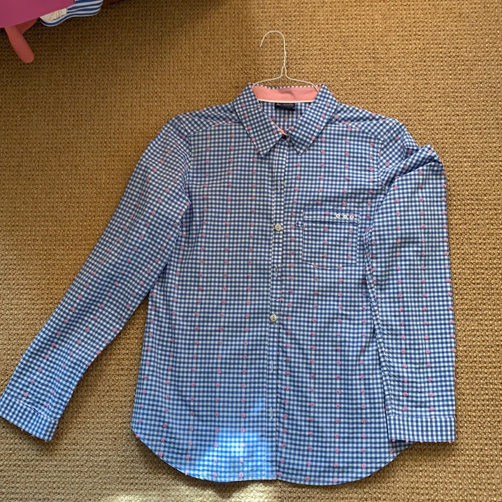 Columbia blue and white check with pink tufts throughout.